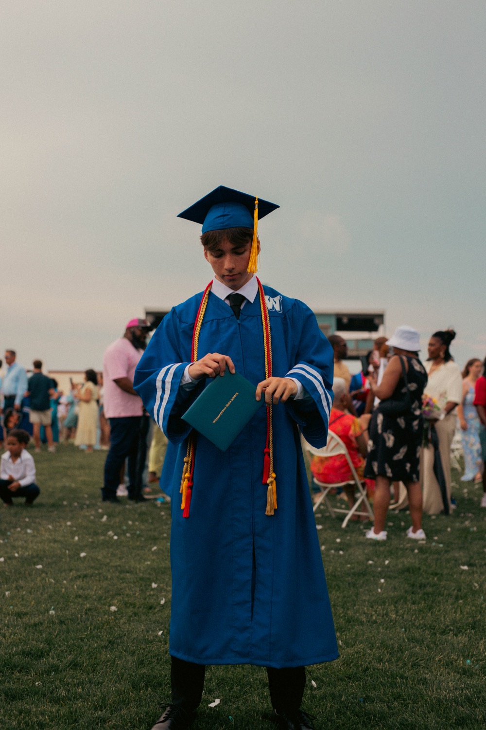 Graduates celebrating in golden light